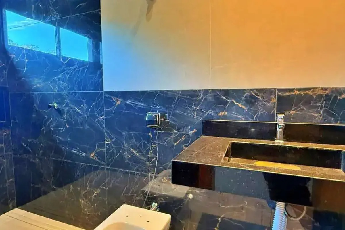 Casa 4 Suítes, 240 m² c/ Lazer à Venda no Caribe Golf — foto